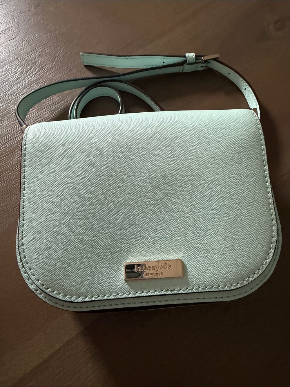 kate spade mint green crossbody with gold logo